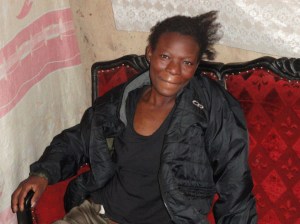 Woman in slums enjoying her new jacket