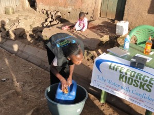 LFK Vendor cleaning a water storage container